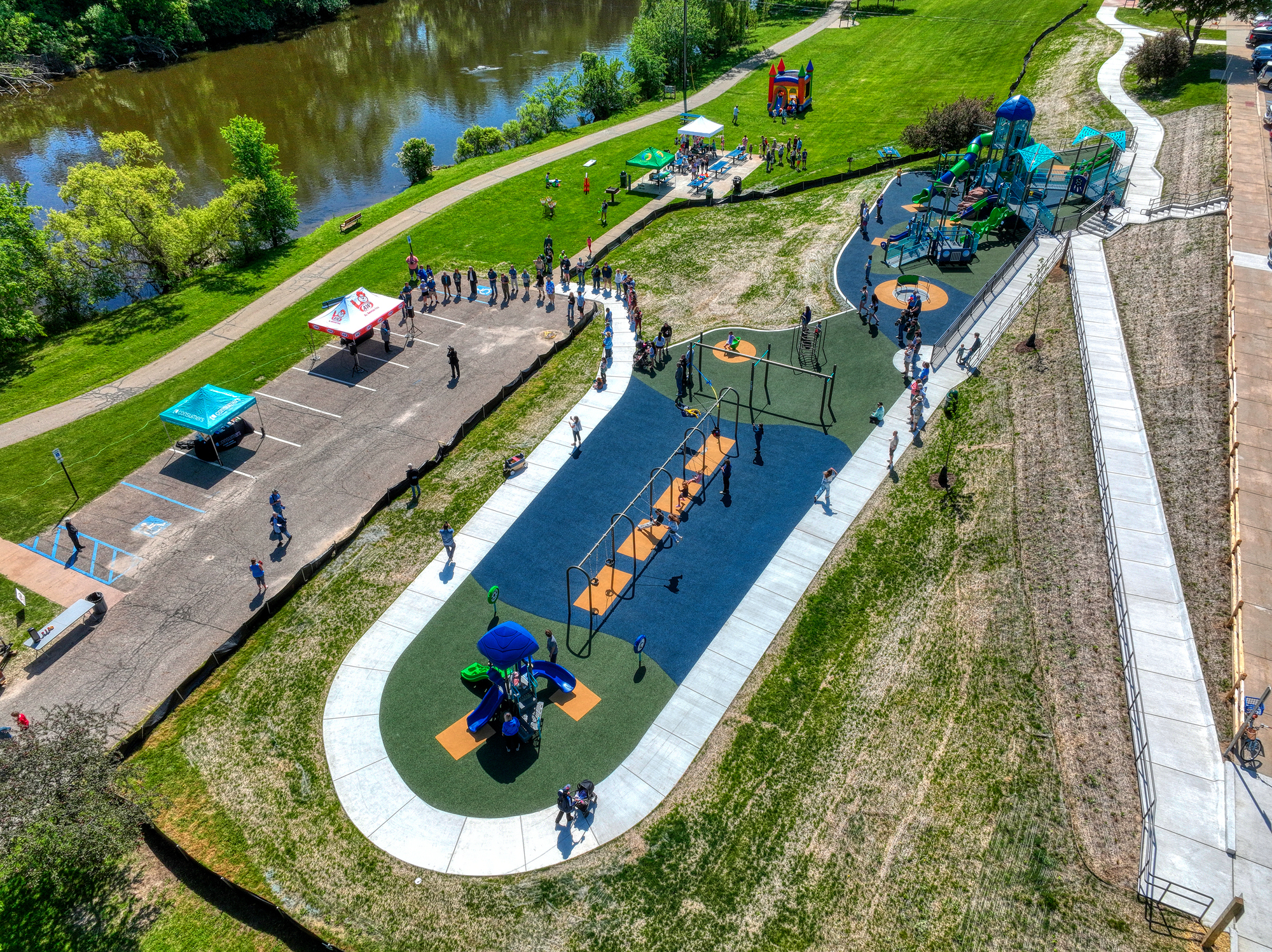 Aerial view of the all-inclusive playground at Jaycee Park beside the river
